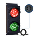 Four inch traffic light with red and green lights, power switch, and cable on a white background.