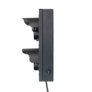 Black wall-mounted traffic light on a white background.