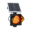 Solar powered 8 inch single amber lens traffic light on a white background.