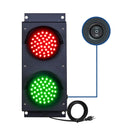 Four inch traffic light with red and green lights, power switch, and cable on a white background.