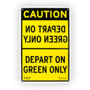 A yellow and black 'CAUTION Depart on Green Only' sign made of aluminum with predrilled corner holes.